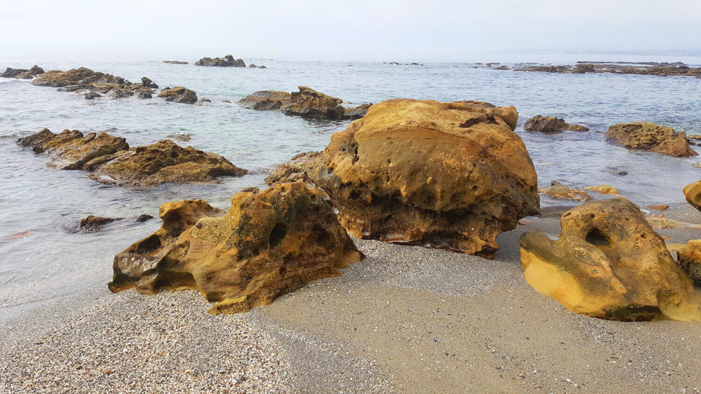 Picture of misty Punta Chullera, rocky secluded beach of Costa de Sol